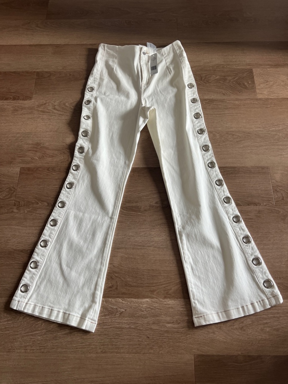 Bebe White Women's Eyelet-Trim Flare Jeans